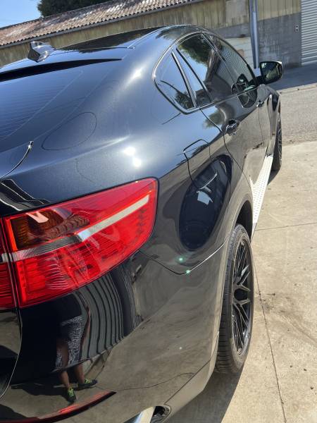 Pose traitement céramique complet Krytex pour carrosserie sur un BMW X6 à Lille