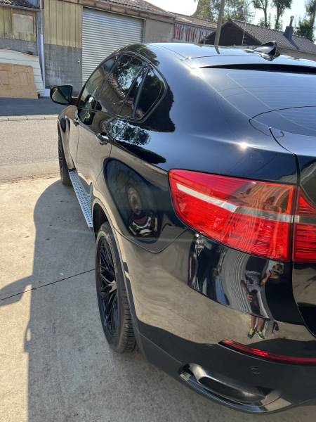 Pose traitement céramique complet Krytex pour carrosserie sur un BMW X6 à Lille