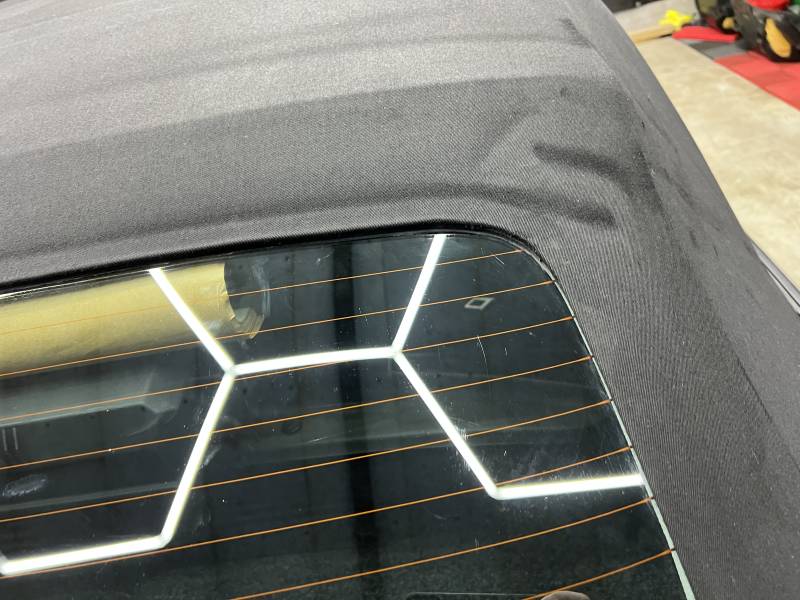 recollage des lunettes arrière sur capotes de cabriolet sur Arras dans le nord pas de calais